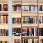 Epping Forest family home | Library bookcase cabinetry | Interior Designers